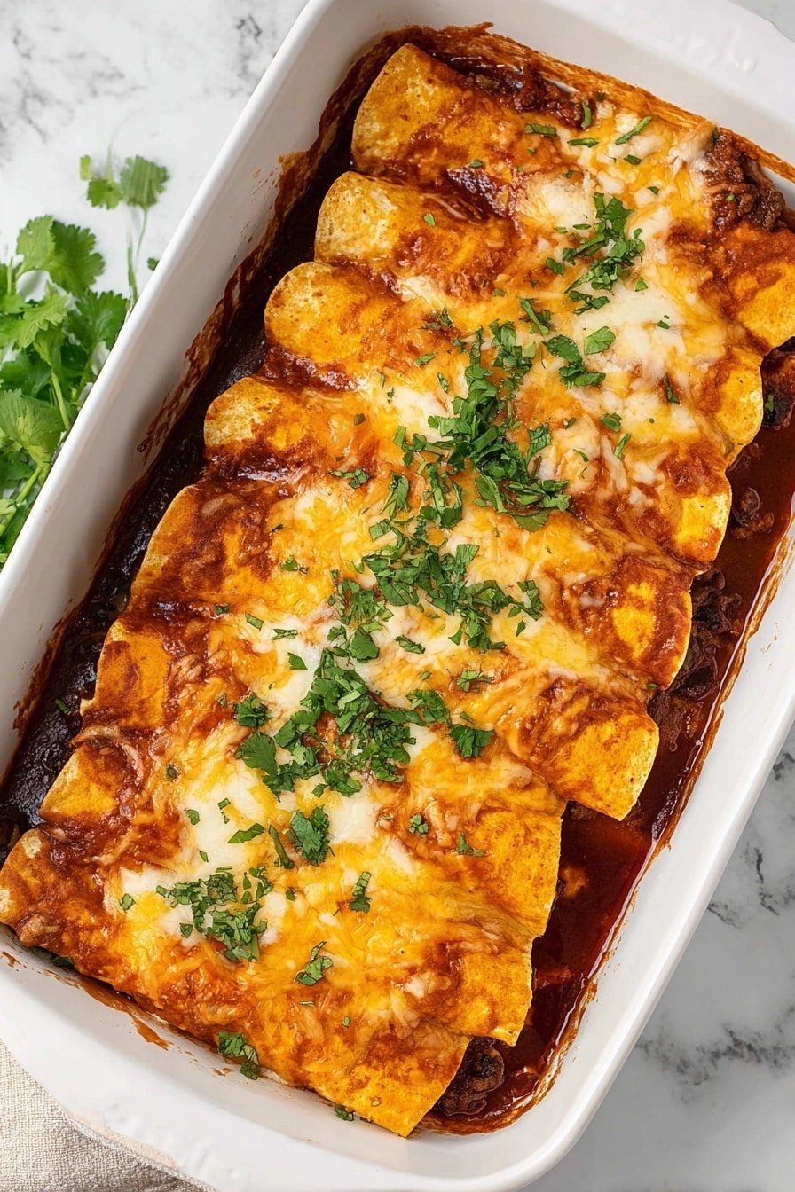 The image shows a white rectangular baking dish filled with six rolled enchiladas placed side by side. The enchiladas have a golden-yellow corn tortilla layer wrapped around a dark brown filling visible at the edges. They are covered in melted cheese with a mix of white and orange colors, slightly browned and bubbling. A red sauce coats the bottom and sides of the dish, peeking out slightly around the edges of the enchiladas. Fresh green chopped cilantro is sprinkled on top for garnish. The dish rests on a white marbled surface with some cilantro leaves nearby. photo taken with an iphone --ar 2:3 --v 7