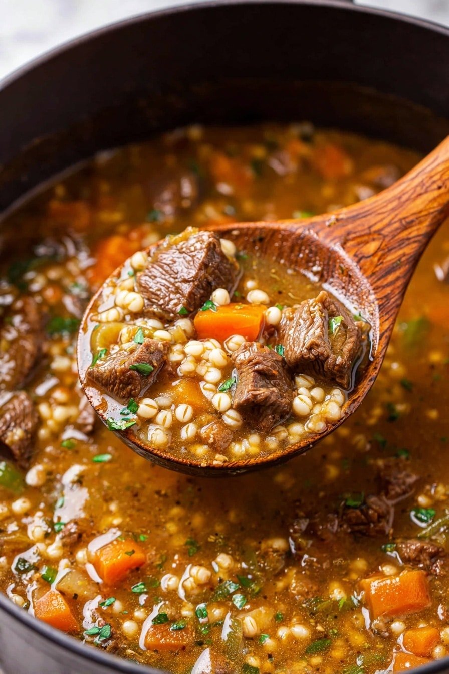 A close-up of thick stew in a dark pot with visible layers of ingredients, including medium-sized pieces of brown beef, small pale grains resembling barley, soft orange carrot pieces, and small green herb bits, all mixed in a rich, light brown broth with a slightly glossy and chunky texture. A wooden spoon is lifting a spoonful of the stew, showing a good mix of the beef chunks, grains, carrots, and herbs. The pot edges have some slight splashes of the stew's sauce. The scene is set on a white marbled surface. photo taken with an iphone --ar 2:3 --v 7