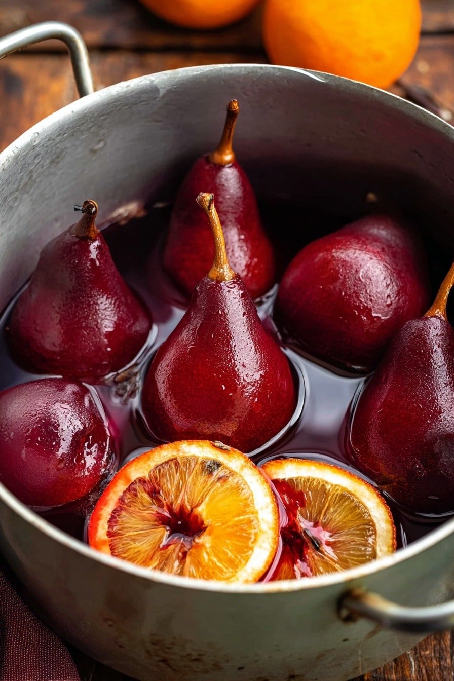 A white pot filled with six whole pears that are deep red and smooth, soaked in a dark red liquid. The pears have small brown stems, and three orange slices with a slightly caramelized look float around them. The pot sits on a wood texture, and the background has a blurred texture. photo taken with an iphone --ar 2:3 --v 7
