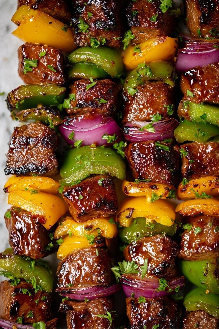 The image shows several skewers tightly packed side by side. Each skewer has an even pattern with four layers starting with a shiny, grilled brown meat cube followed by a thick piece of green bell pepper, then a slice of purple-red onion, and lastly a bright yellow bell pepper slice. The meat looks juicy and slightly charred, with small green parsley pieces sprinkled over all the skewers. The bell peppers and onions have a slightly grilled texture, showing some dark grill marks. The close-up view clearly shows the glossy and moist surface of the ingredients. The background is a white marbled texture. photo taken with an iphone --ar 2:3 --v 7